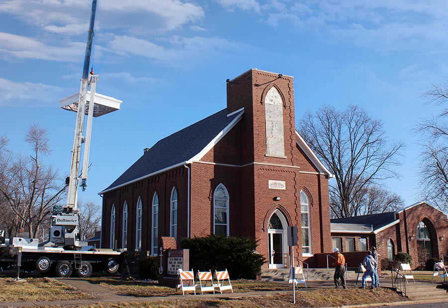 Steeple base being placed on Hoyleton Zion Evangelical United Church Of Christ in Mt. Vernon, Illinois